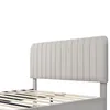 Close-up of a modern bed frame with a padded headboard and wooden slats. Náhled obrázku produktu