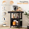 A black kitchen cart with a wooden countertop, featuring various design details highlighted with text and close-up images. Podgląd zdjęcia produktu