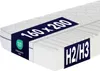 A cutaway view of a mattress showing its internal structure, with labels indicating its size and firmness. Produktbild-Vorschau
