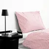A close-up view of a bed with pink and gray striped bedding. Produktbild-Vorschau