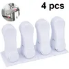 Four white child safety locks arranged in a row. Produktbild-Vorschau