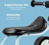 Close-up of a child's balance bike seat and handlebars with descriptive text. Náhled obrázku produktu