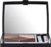 An open makeup palette with eyeshadows and applicators. Podgląd zdjęcia produktu