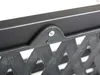 A close-up view of a black metal bracket connecting two parts of a black lattice structure, secured by a silver screw. Produktbild-Vorschau