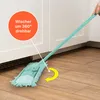 A mint-colored mop with a chenille cover is being used to clean a wooden floor next to white cabinets. An orange circle with German text is overlaid on the image, highlighting a feature of the mop. Produktbild-Vorschau