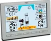 A digital weather station displaying time, date, temperature, humidity, and weather icons, with a cartoon illustration of a person on a beach. Anteprima dell’immagine prodotto