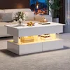 A modern living room with a white coffee table. Anteprima dell’immagine prodotto