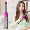 Grauer und magentafarbener Haarstyler, von einer Frau im Badezimmer gehalten, mit einem weiteren aufrecht stehenden Styler Podgląd zdjęcia produktu