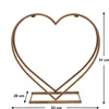 A metal heart-shaped stand with dimensions indicated. Produktbild-Vorschau