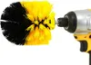 A cleaning brush attached to a power drill. Voir les images du produit