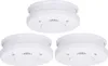 Three white smoke detectors are arranged in a triangular formation against a white background. Produktbild-Vorschau