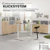 A modern office setup with modular storage units and a standing desk. Produktbild-Vorschau