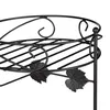 Close-up of a black metal plant stand with decorative leaf elements. Náhľad obrázku produktu