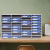 A file organizer with many blue folders is placed on a wooden desk in front of a green wall. Náhled obrázku produktu