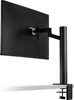 The back of a black LG monitor mounted on a black adjustable arm clamped to a white desk. Produktbild-Vorschau