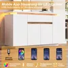 A white sideboard with LED lighting and a wood-tone accent, shown with mobile app control interfaces. Anteprima dell’immagine prodotto
