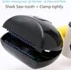 A close-up of a black dog waste scooper with serrated jaws, with a yellow handle visible in the background. Produktbild-Vorschau