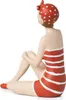A decorative figurine of a woman in a vintage-style red and white striped swimsuit and polka dot swim cap, sitting on a white background. Voir les images du produit