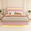 A pink upholstered bed with LED lighting. Produktbild-Vorschau