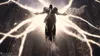 A figure in armor with glowing energy emanating from it, set against a backdrop of ruins. Produktbild-Vorschau