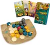 A board game with colorful tokens and cards, set on a light brown and white hexagonal board. Produktbild-Vorschau