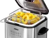 A close-up shot of a stainless steel deep fryer filled with golden-brown onion rings. Produktbild-Vorschau