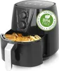 A black air fryer filled with chicken nuggets and french fries. Produktbild-Vorschau