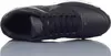 A black Nike sneaker is shown from a top-down perspective, resting on a reflective surface against a white background. Voir les images du produit
