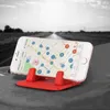 A smartphone displaying a map app is mounted on a red silicone car mount on a car dashboard, with a road and sky in the background. Voir les images du produit