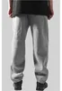 A person wearing grey sweatpants from the back. Produktbild-Vorschau