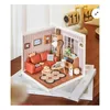 A miniature room diorama with furniture and accessories, placed on a desk. Anteprima dell’immagine prodotto