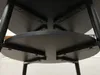 Underside view of a black round coffee table with multiple tiers. Produktbild-Vorschau
