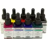 A collection of small bottles of colored ink with droppers. Produktbild-Vorschau