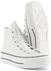 A pair of white Converse Chuck Taylor All Star Lift Leather High top sneakers. Produktbild-Vorschau