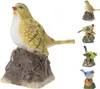 A collection of decorative bird figurines on a white background. Produktbild-Vorschau