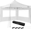 A white pop-up tent with windows and accessories laid out in front of it. Produktbild-Vorschau
