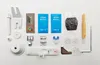 A collection of sewing machine accessories laid out on a white background. Produktbild-Vorschau