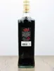 A bottle of Averna Amaro Siciliano on a wooden surface. Produktbild-Vorschau