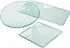 Three pieces of glass: a round one, a rectangular one, and a square one, are arranged on a white background. Produktbild-Vorschau