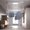 A modern laundry room with a ceiling-mounted electric clothes drying rack. Produktbild-Vorschau