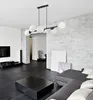 A modern living room with a sectional sofa, coffee table, and television. Náhled obrázku produktu