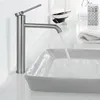 A modern bathroom sink with a silver faucet running water into it. Podgląd zdjęcia produktu