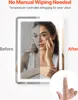 A split image showing a mirror before and after defogging, with a hand touching a button. Náhled obrázku produktu