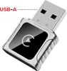 A close-up, angled view of a silver and black USB adapter with a play icon on its black surface. Voir les images du produit