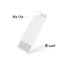 A white cleaning tool with a knife edge and brush on a white background. Produktbild-Vorschau