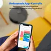 A person is holding a smartphone displaying a map of rooms, with a robot vacuum cleaner in the background. Produktbild-Vorschau
