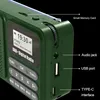 Close-up view of the side and top of a green digital radio, highlighting various ports and buttons. Produktbild-Vorschau
