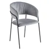 A gray velvet dining chair with black metal legs, shown from the front on a white background. Produktbild-Vorschau