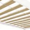 Close-up view of wooden slats and white frame of a bed. Voir les images du produit