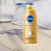 Nivea Brązujący balsam do ciała, 400ml Náhľad obrázku produktu 7
